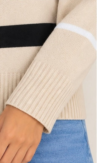 Gilet en maille rayé beige et noir à boutons dorés