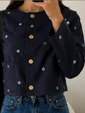 Veste en jean avec des trous - vue de dos