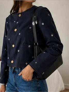 Veste en jean avec des trous - détail poche et œillets